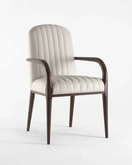 Serano luxury dining chair front view with vertical channel tufted back and wooden armrest design