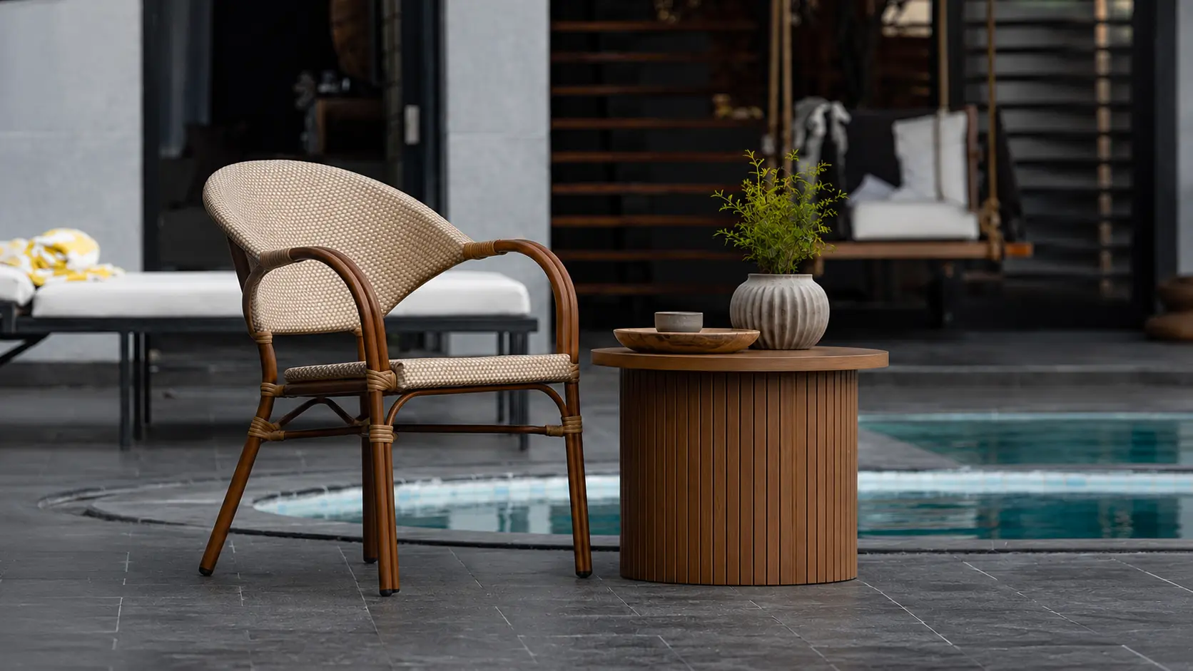 Premium luxury poolside outdoor chair modern villa. Manufactured by Craftnika, supplying luxury furniture to Jaipur and Pan-India.