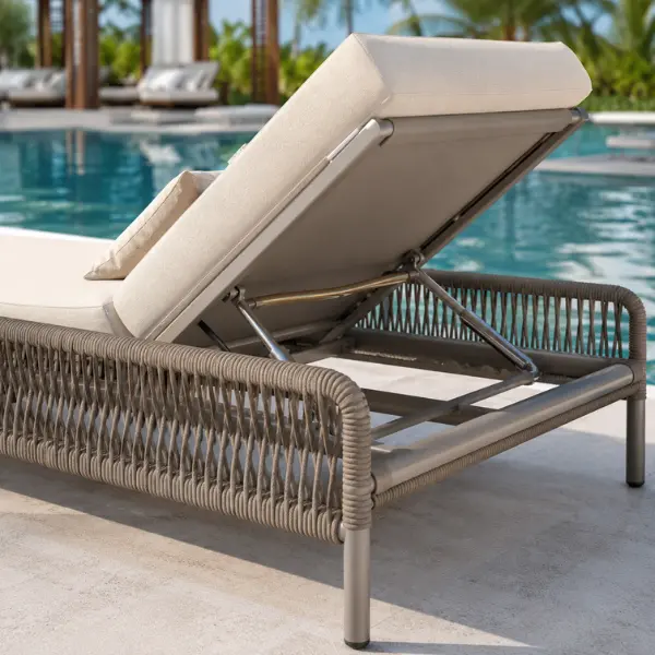 Commercial poolside dining set featuring powder-coated aluminium frame and UV-stable rope weaving at resort terrace in India