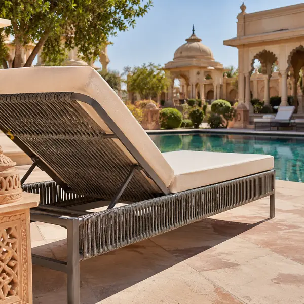 UV-stabilized weatherproof poolside loungers designed for luxury hotels and resorts in Jaipur's extreme climate.