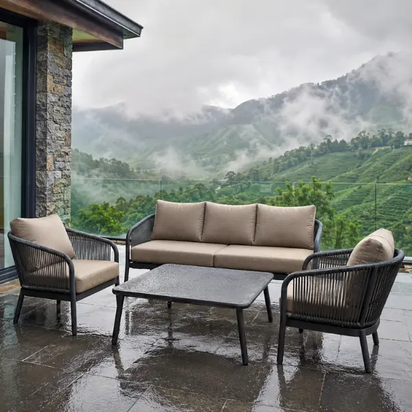 Elegant commercial outdoor dining set placed in a scenic tea garden resort, showcasing durable teak wood and waterproof upholstery.