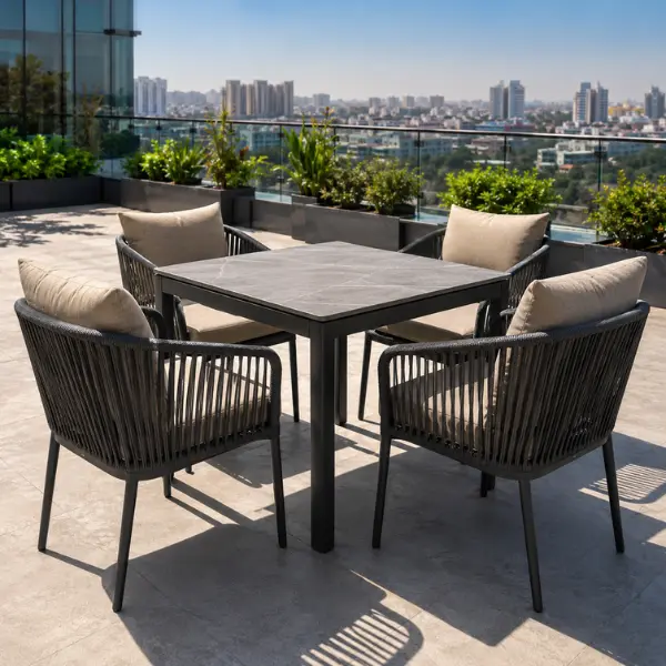 Stylish commercial outdoor seating arrangement on a cafe patio, built with heat-deflecting materials to withstand Uttar Pradesh summers.