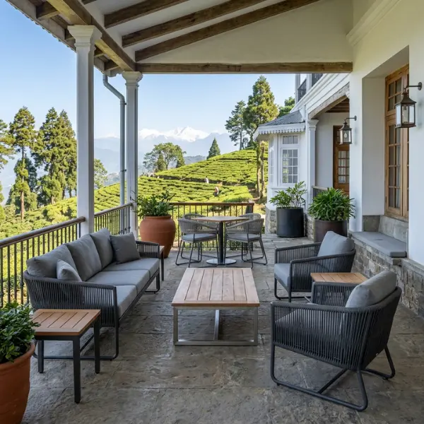 Vintage-style outdoor seating for heritage tea estate bungalows in Darjeeling, showcasing robust materials resistant to hill monsoon humidity.