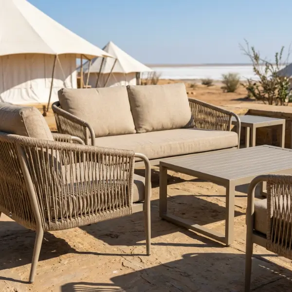 Weatherproof outdoor lounge chairs and tables manufactured for Kutch tented camps and desert resort dining spaces.