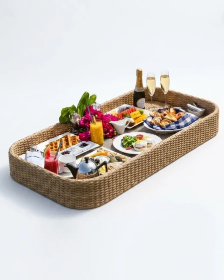 The Aurela floating breakfast tray for pool, featuring hand-woven HDPE wicker over a rust-proof aluminum frame.