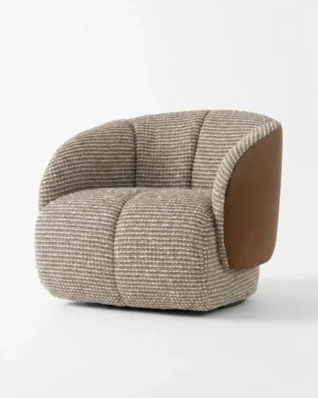 Luxury Bellucci Lounge Chair featuring a curved channel tufted boucle interior, contrast leather back, and a solid wood core.