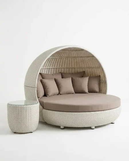 Luxury Capri canopy wicker outdoor daybed featuring a rust-proof aluminium frame and a white UV-stabilized HDPE wicker hood, manufactured for high-end resorts.