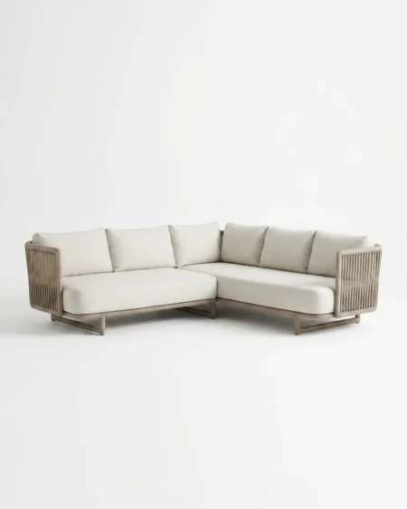 The Corsica Rope Weave Sectional Sofa featuring a sophisticated L shaped corner design with a powder coated metal frame and beige cushions.