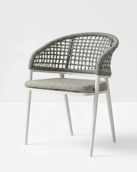 Luxury white marine-grade aluminium Cortina lattice-weave armchair with UV-stabilized rope for commercial outdoor dining sets.