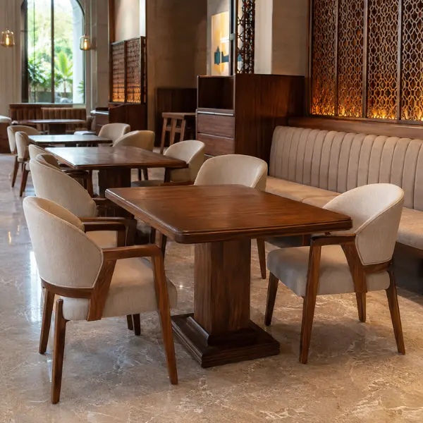 Heavy-duty custom restaurant dining tables and seating delivered to Nashik properties.