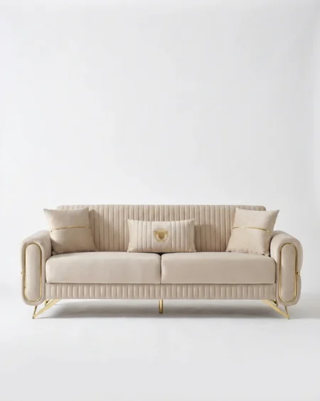 Luxury Elandra Ribbed Velvet Sofa featuring a solid kiln-dried wood frame, cream velvet upholstery, and an elegant brass metal frame for living rooms.
