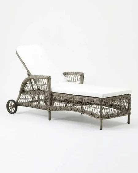 Luxury Grayson wicker sun lounger featuring a rust-proof aluminium frame, transport wheels, and UV-stabilized synthetic rattan, manufactured for high-end resorts.