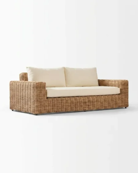 The Havelock Box Weave Rattan Sofa featuring a sophisticated 2-seater design with a chunky woven box frame and cream cushions.