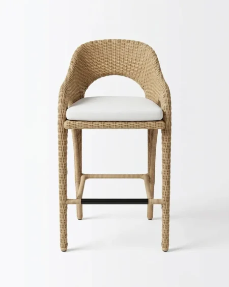 Premium natural tone UV-stabilized full wicker Larkspur bar stool with marine-grade aluminium frame and cushioned seat for luxury hotels.