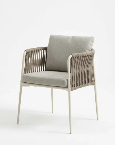 Luxury white marine-grade aluminium Linea vertical rope armchair with UV-stabilized slat weave and plush cushion for commercial outdoor dining sets.