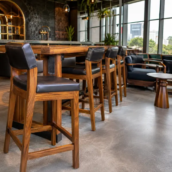 Plush lounge sofas and fixed booth seating built with commercial-grade upholstery for a nightclub.