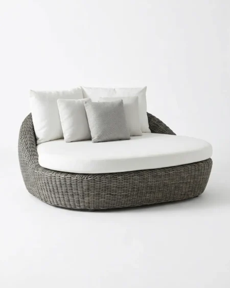 Luxury Marbella wicker round outdoor daybed featuring a rust-proof aluminium frame and UV-stabilized synthetic grey rattan, manufactured for high-end resorts.
