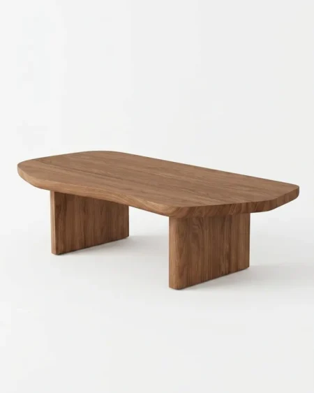 The Mridang Walnut Coffee Table featuring a massive live edge solid wood slab supported by robust architectural wooden legs.