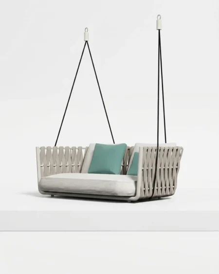 The Riva Woven Hanging Sofa Swing featuring a minimalist two-seater design and premium white rope strap weave.