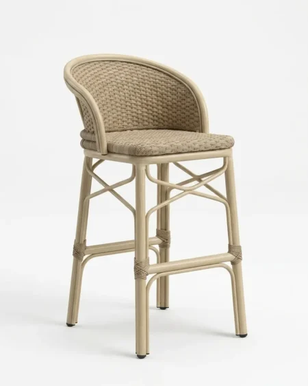 Premium wood-finish marine-grade aluminium Rutherford bar stool with UV-stabilized cushionless full wicker weave for luxury hotels.