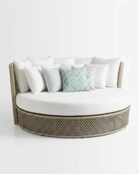 Luxury Sablewood wicker round outdoor daybed featuring a rust-proof aluminium frame and UV-stabilized natural synthetic rattan, manufactured for high-end resorts.