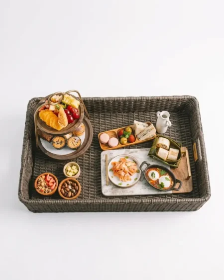 The Serengeti Rectangular Weave Tray featuring a large serving area and UV-stabilized grey PE rattan weaving over an aluminum frame.