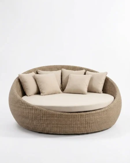 Luxury Serrano cocoon wicker outdoor daybed featuring a rust-proof aluminium frame and a natural UV-stabilized HDPE rattan nest, manufactured for high-end resorts.