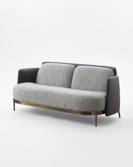 Luxury Verano Two-Tone Sofa featuring a solid kiln-dried wood frame, striking fabric interior with a charcoal leather shell, and a bronze metal frame for living rooms.