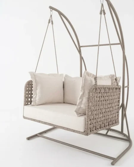 The Verona Two Seater Swing Set featuring beige woven rope detailing and a rust-proof marine-grade aluminum frame.