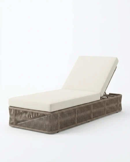 Luxury Weston wicker sun lounger featuring a rust-proof aluminium frame and UV-stabilized taupe synthetic rattan, manufactured for high-end resorts.