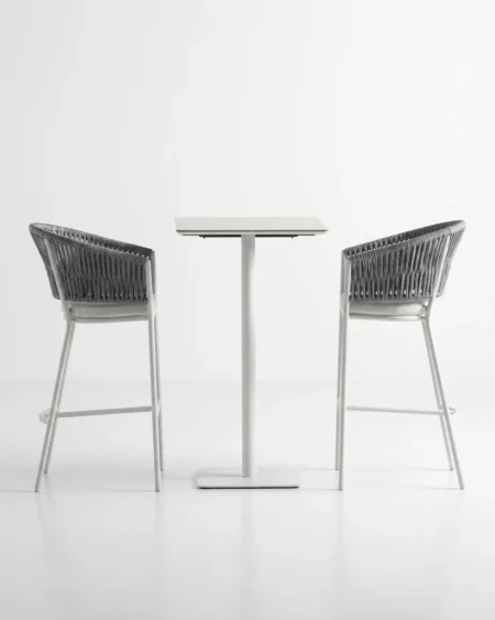 Marine-grade whitfield bar table and stool set with crisp white powder-coated frames and grey vertical rope weave