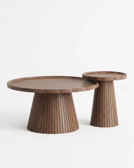 The Yubari Fluted Pedestal Table Set featuring a two-piece round tray top design resting on architectural conical fluted wood bases.