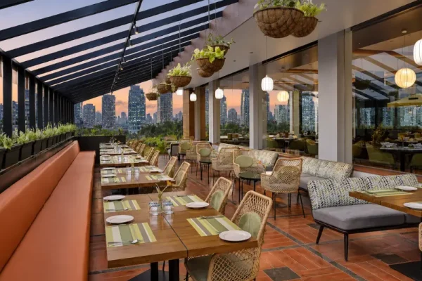 Premium rope woven dining chairs and tables in NCR rooftop restaurant